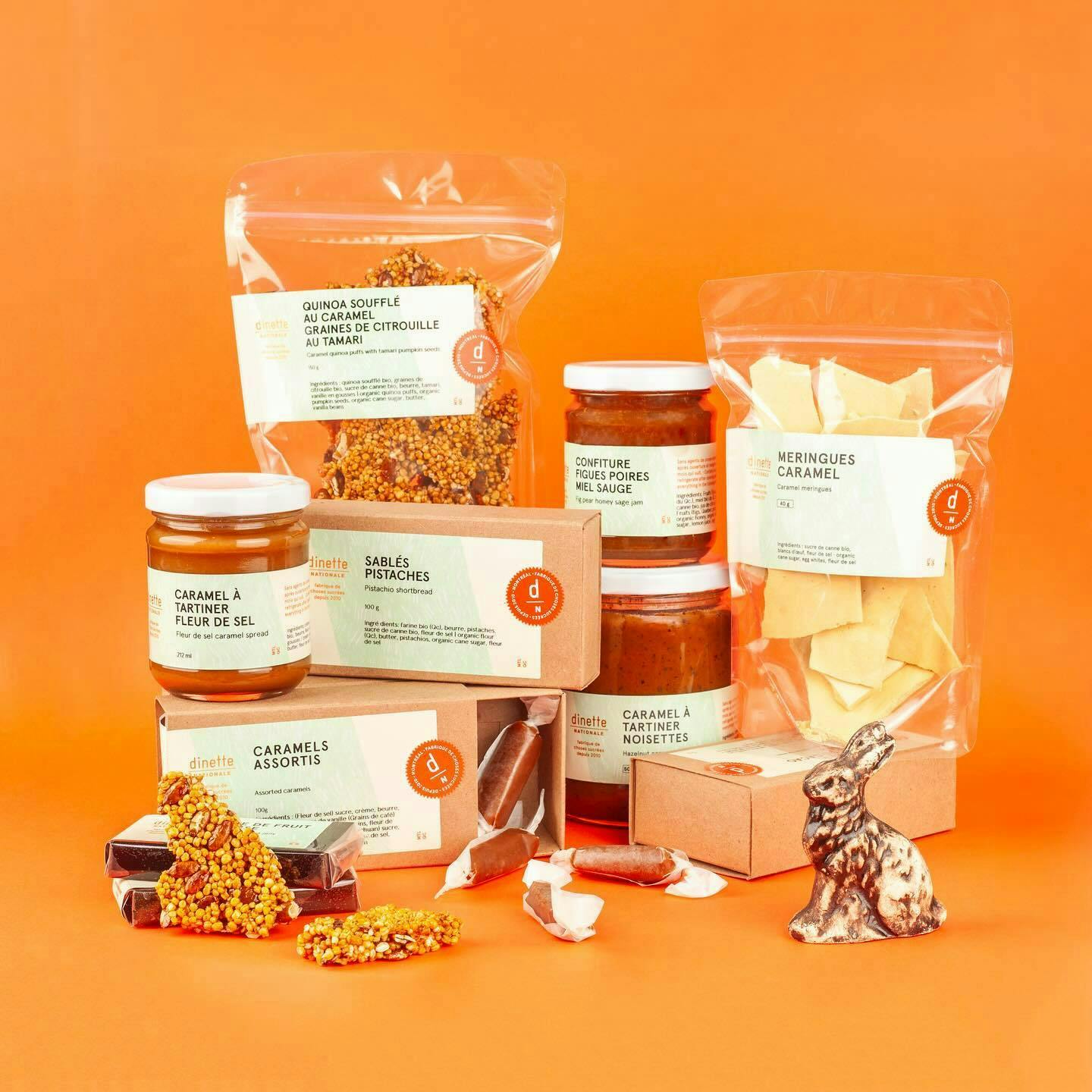 Various Dinette Nationale products against an orange background