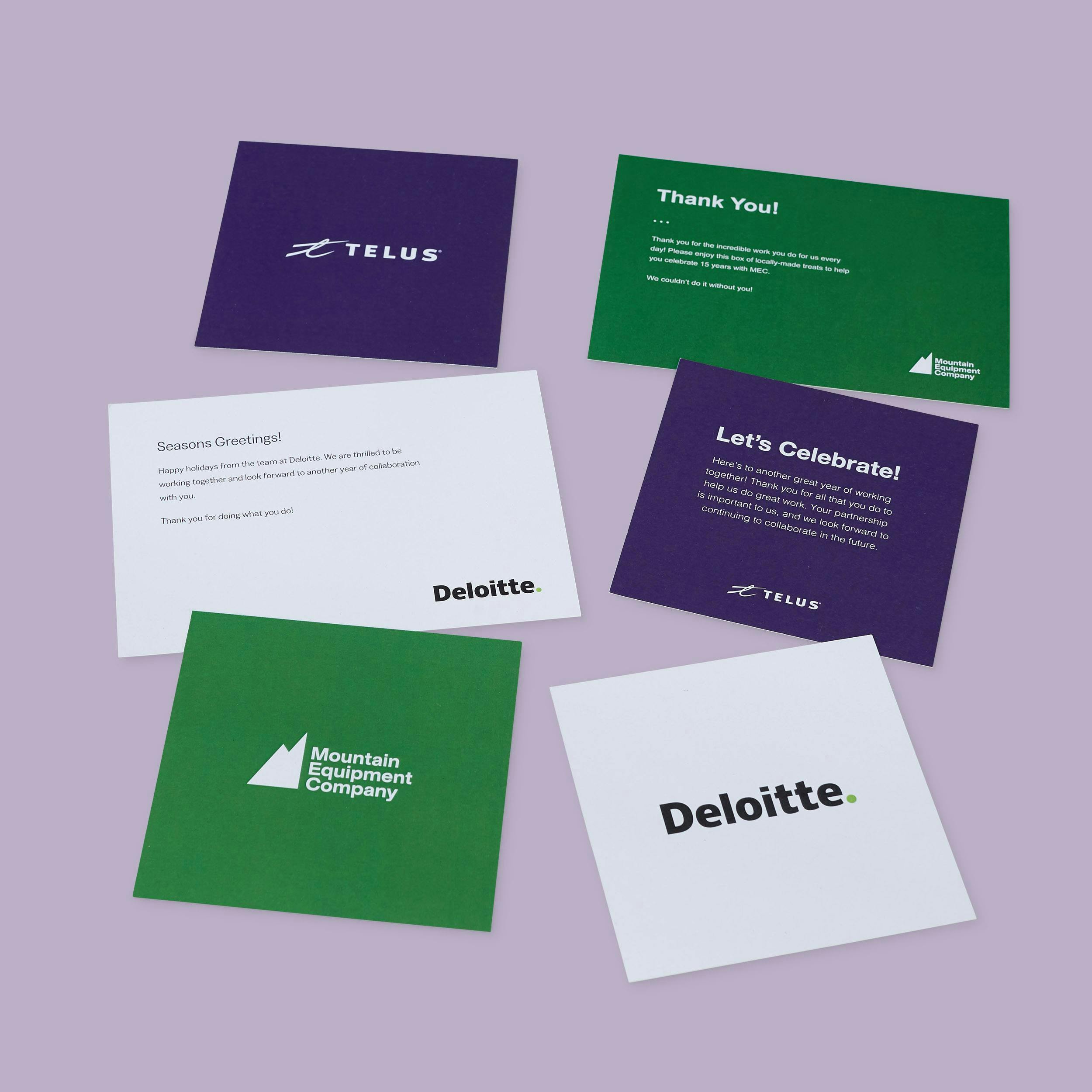 Branded greeting cards showing various corporate logos