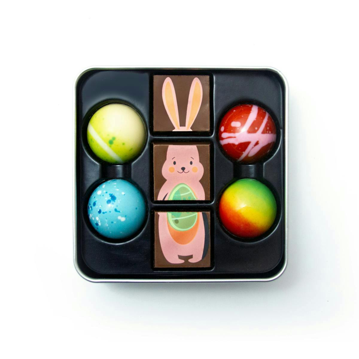 Chocolates with a cartoon bunny illustration and colourful round designs.